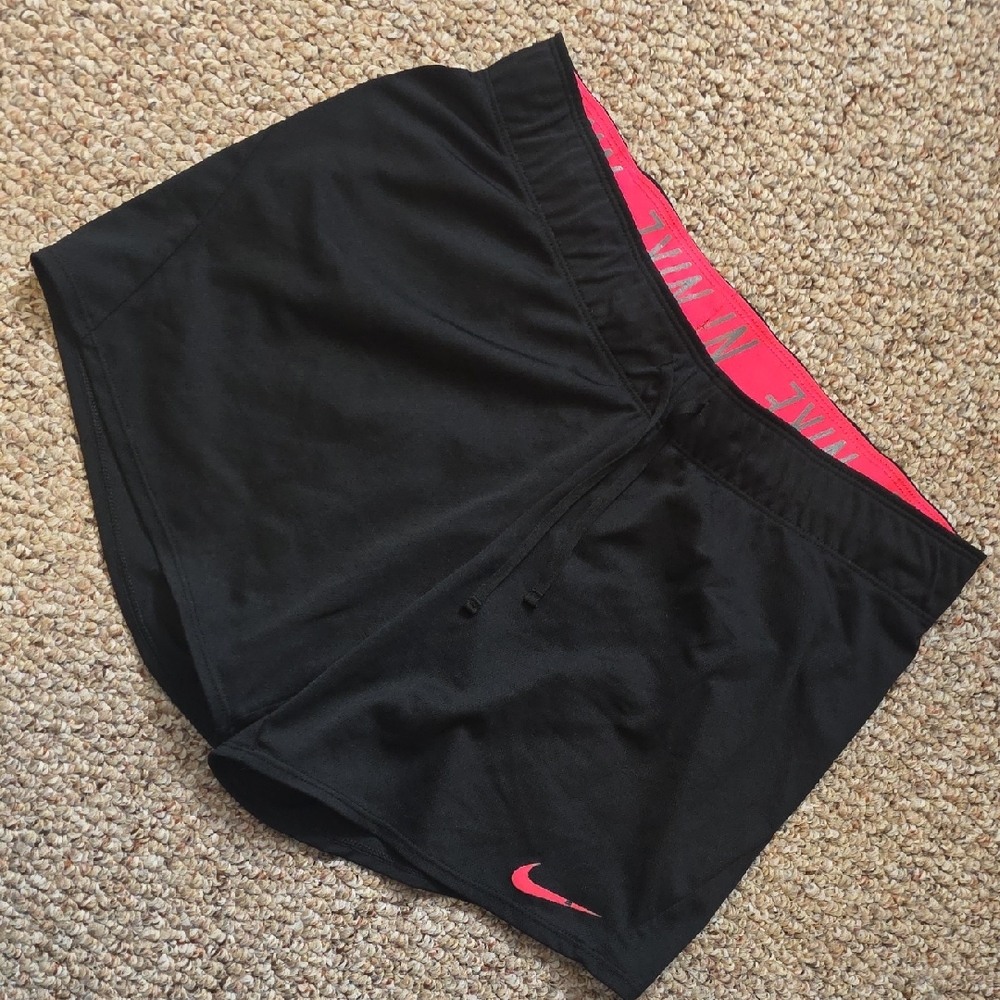 Nike Black Women's Athletic Shorts with Pink Trim and Swoosh